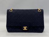 chanel navy quilted lambskin flap bag