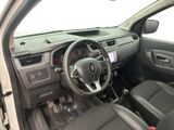 the interior of a car with a steering wheel and dashboard controls