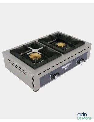 a close up of a stove top with two burners on it
