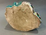 a large piece of pottery that is sitting on a table