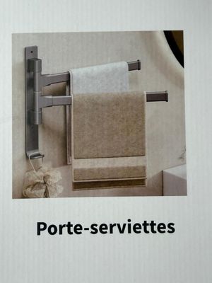 a picture of a picture of a bathroom with a towel rack