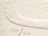 a drawing of a cat on a piece of paper