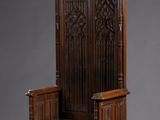 an old wooden bench with a carved back and a carved seat