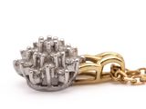 an image of a silver and gold necklace on a chain