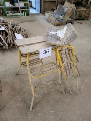 a small table with a number on it in the middle of a room