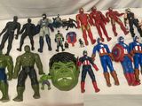 a lot of action figures that are on the table