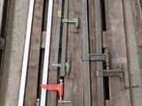 several pieces of wood sit on top of a pallet in a garage