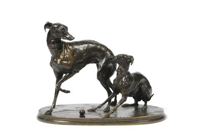 bronze statue of a dog and a cat on a marble base