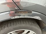 a close up of a sticker on a car ' s tire