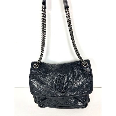 Sac à bandoulière Chanel en cuir d'agneau matelassé noir