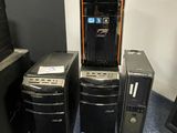 several computers are stacked on top of each other in a room