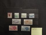 a picture of a collection of stamps on a black background
