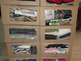 a carton of clothes that is sitting on a carton