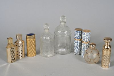 a lot of glass bottles that are sitting on a table