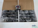 a cardboard box with a digital thermometer in it