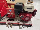 an image of a small engine on a cart