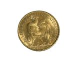 an image of a gold coin with a rooster on it