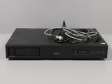 a close up of a dvd player sitting on top of a table