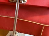 a red piece of luggage sitting on a table