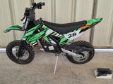 a dirt bike parked in front of a building