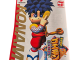 a magazine with a picture of a boy holding a baseball bat