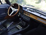 a dashboard and steering wheel of a car in a car showroom