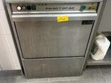 a dishwasher that is sitting in the corner of a kitchen