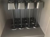 a small cabinet with a bunch of speakers on top of it
