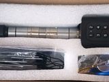 a box with a flashlight and other items inside of it