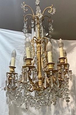 a chandelier that is hanging from the ceiling