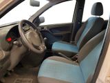 a car with blue seats and a steering wheel