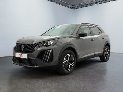 a grey suv is parked in a large room