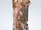 une image représentant la statue d'un homme avec un chien