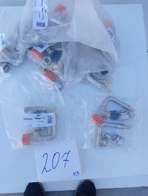 a lot of screws and other electrical components on a table