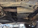 a close up of a car underneath a vehicle