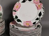many plates stacked on top of each other on a table
