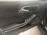 a close up of a car door handle with the door handle open
