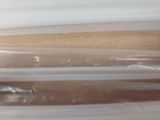 a close up of a plastic bag with a toothbrush inside of it
