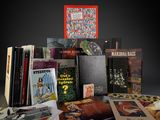 a pile of books sitting on top of a table