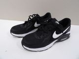 black and white nike air max running shoes on a white surface