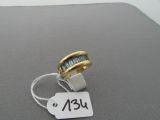 an image of a ring with a tag on it