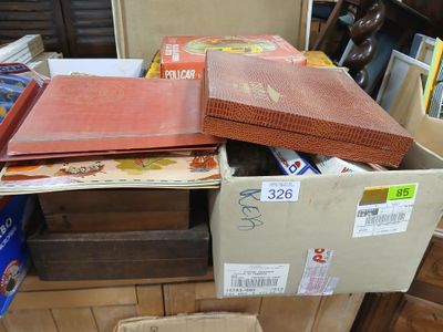 a pile of books sitting on top of a wooden table