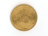 an image of a gold coin on a white surface