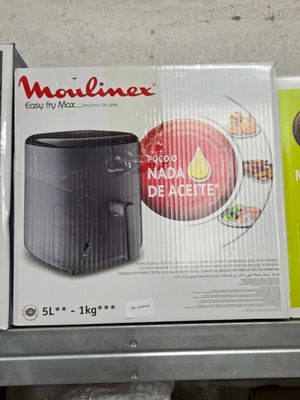 two boxes of food sitting on a shelf next to each other