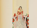 a book with a picture of a woman in a red dress