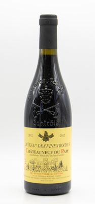 a bottle of wine that is sitting on a table
