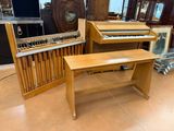 a piano and a piano bench in a room