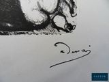 a drawing of a dog laying down on the ground