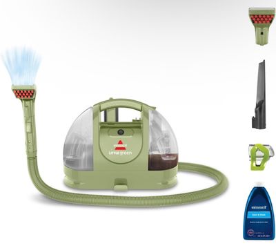 the steam cleaner is being used to clean the floor with a hose