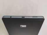 a close up of the back of a laptop computer on a table